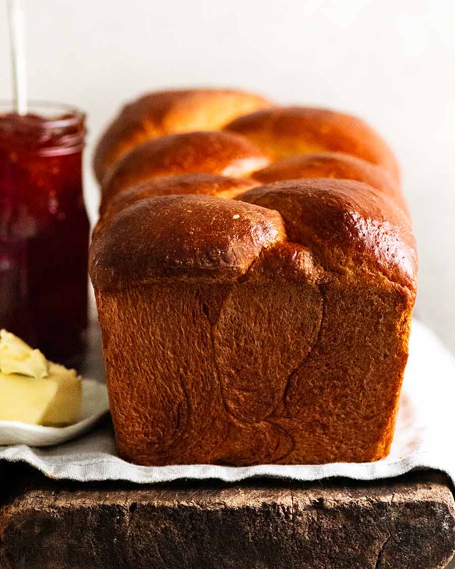 Freshly made Brioche with butter and jam