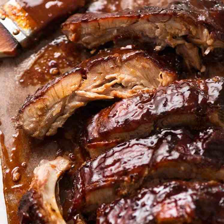 Close up of Barbecue Pork Ribs cooked in Oven with sticky barbecue sauce